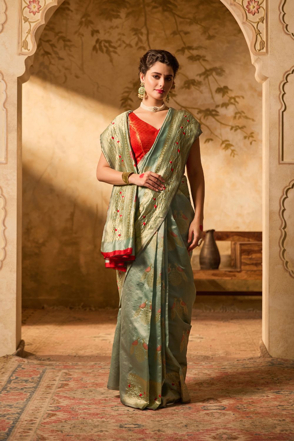 Sea Green Banarasi Silk Saree With Delicate Gold Zari Motifs & Floral Accents