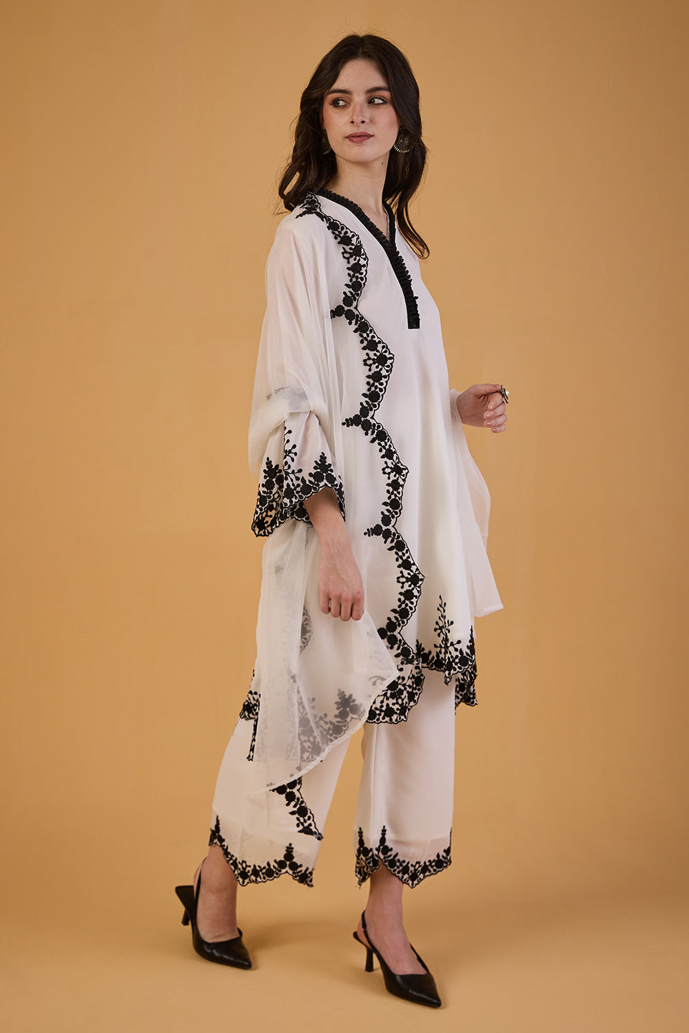 dhartii  Elegant Off-White Embroidered Georgette Suit Set